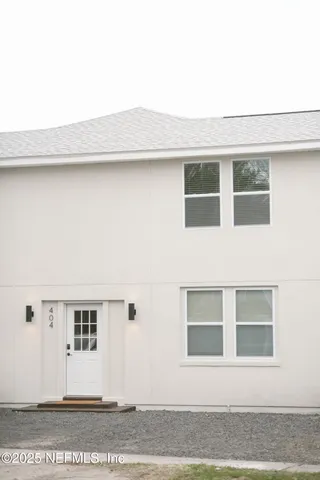 a kitchen with stainless steel appliances a sink and a refrigerator
