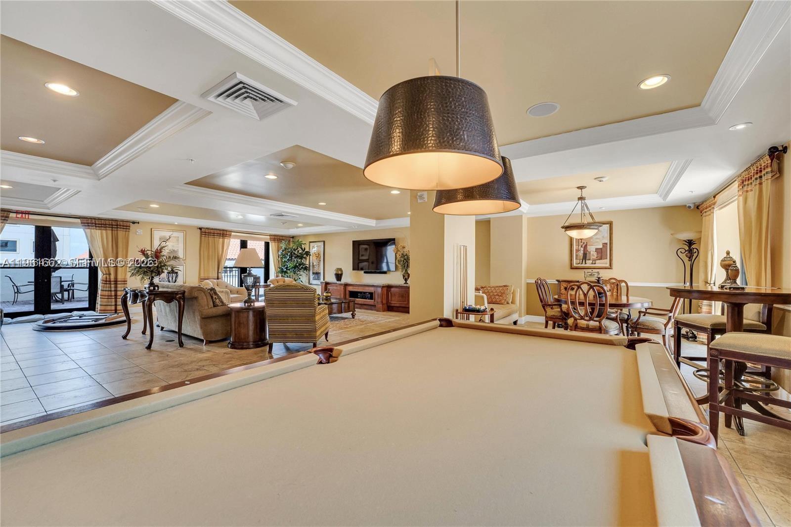 888 Douglas Road, Unit 1401 Coral Gables, FL 33134 - Photo 20 of 43 a view of a room with gym equipment