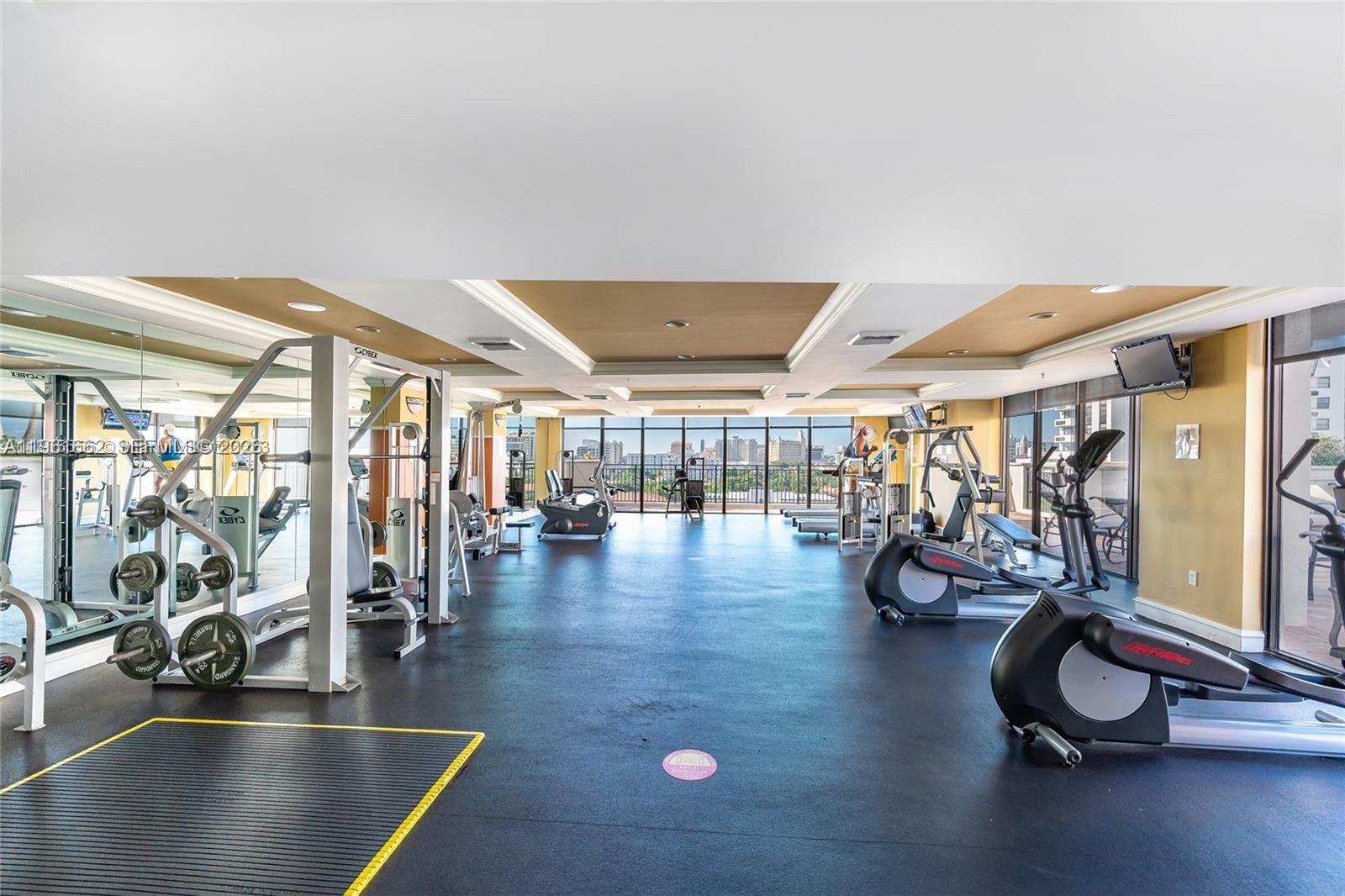 888 Douglas Road, Unit 1401 Coral Gables, FL 33134 - Photo 34 of 43 a view of a room with gym equipment