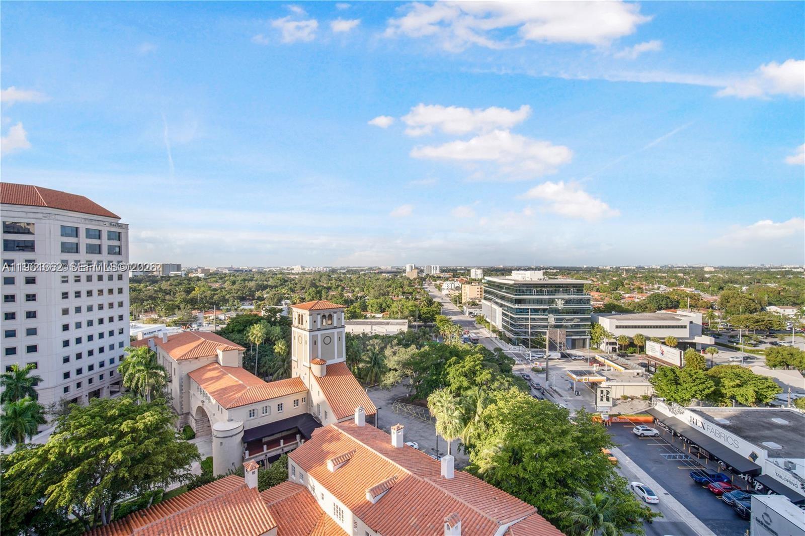 888 Douglas Road, Unit 1401 Coral Gables, FL 33134 - Photo 7 of 43 a view of a city with tall buildings
