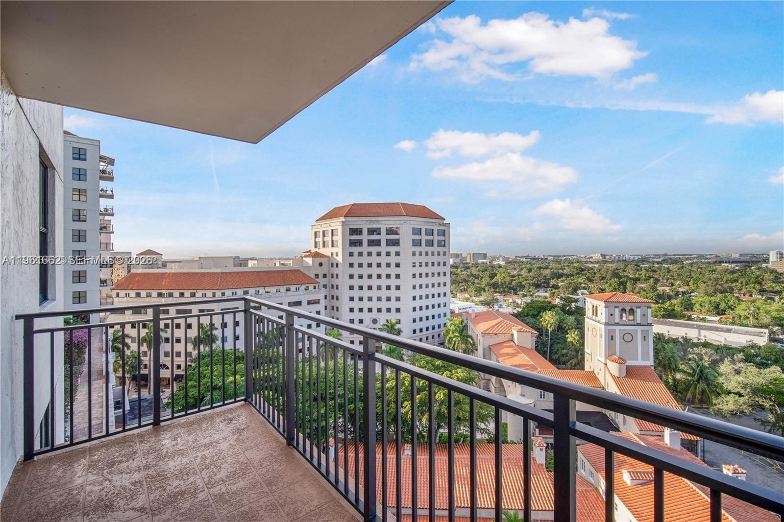 888 Douglas Road, Unit 1401 Coral Gables, FL 33134 - Photo 8 of 43 a view of a city from a balcony