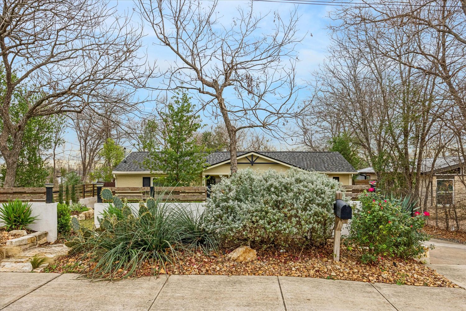 2921 Pecan Springs Road Austin, TX 78723 - Photo 4 of 21 a backyard of a house with lots of green space