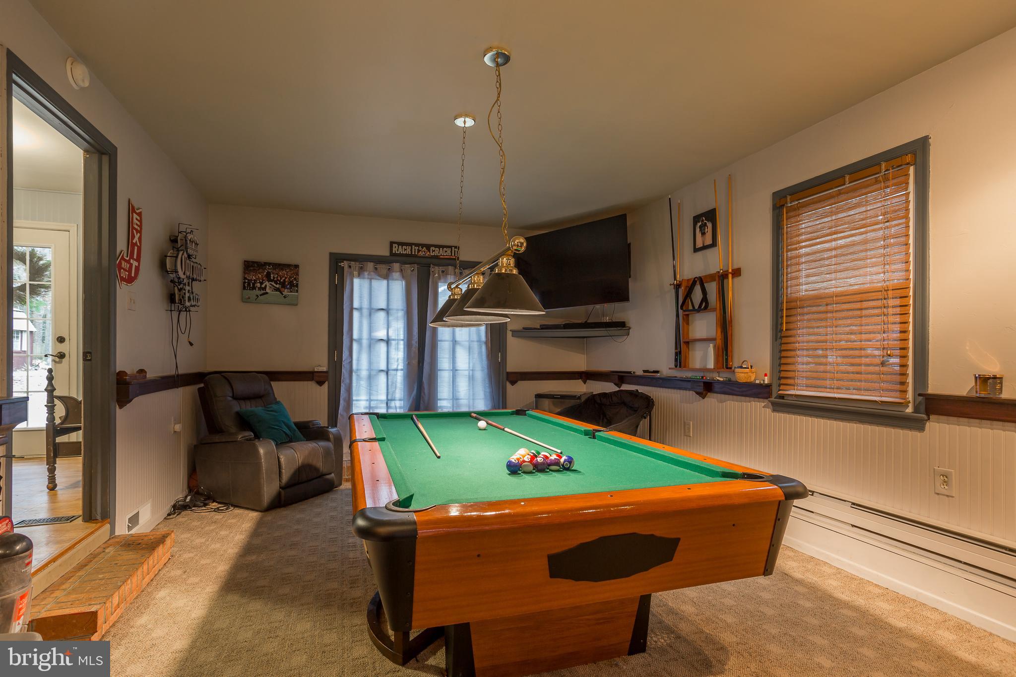 31957 Downing Road Delmar, MD 21875 - Photo 23 of 45 Game room facing rear French doors lead to hot tub