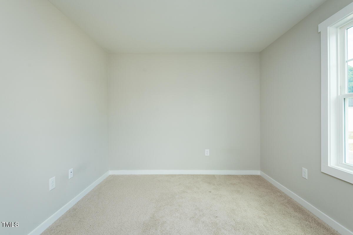 136 Ambergate Court Rocky Mount, NC 27804 - Photo 11 of 22 a view of an empty room and a window