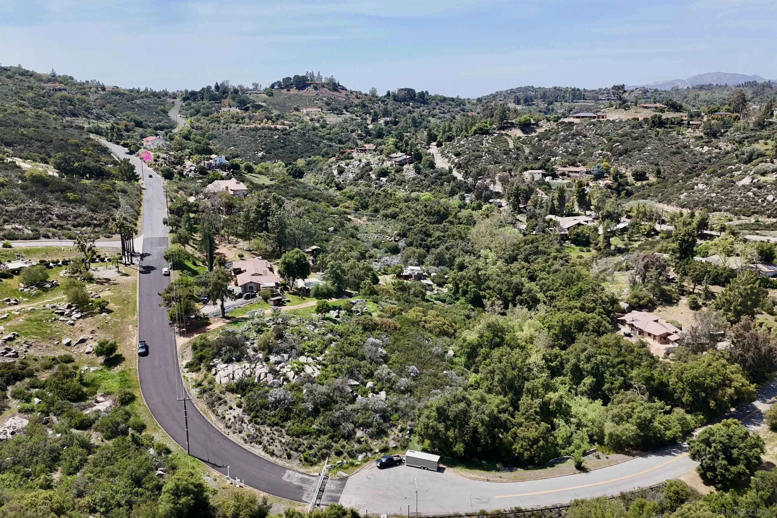 Via Viejas Oeste, Unit 43 Alpine, CA 91901 - Photo 15 of 28 an aerial view of a house with a yard