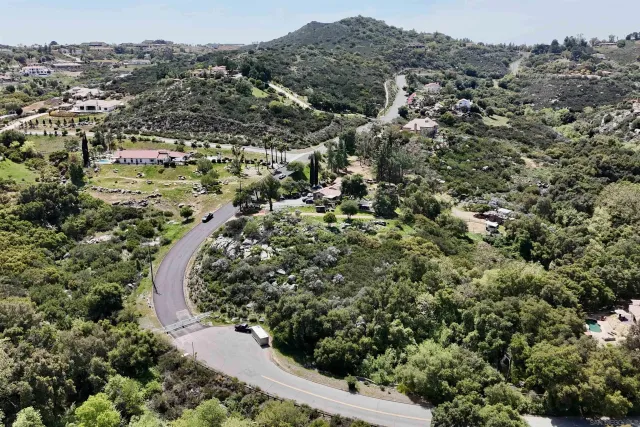 an aerial view of residential house and outdoor space