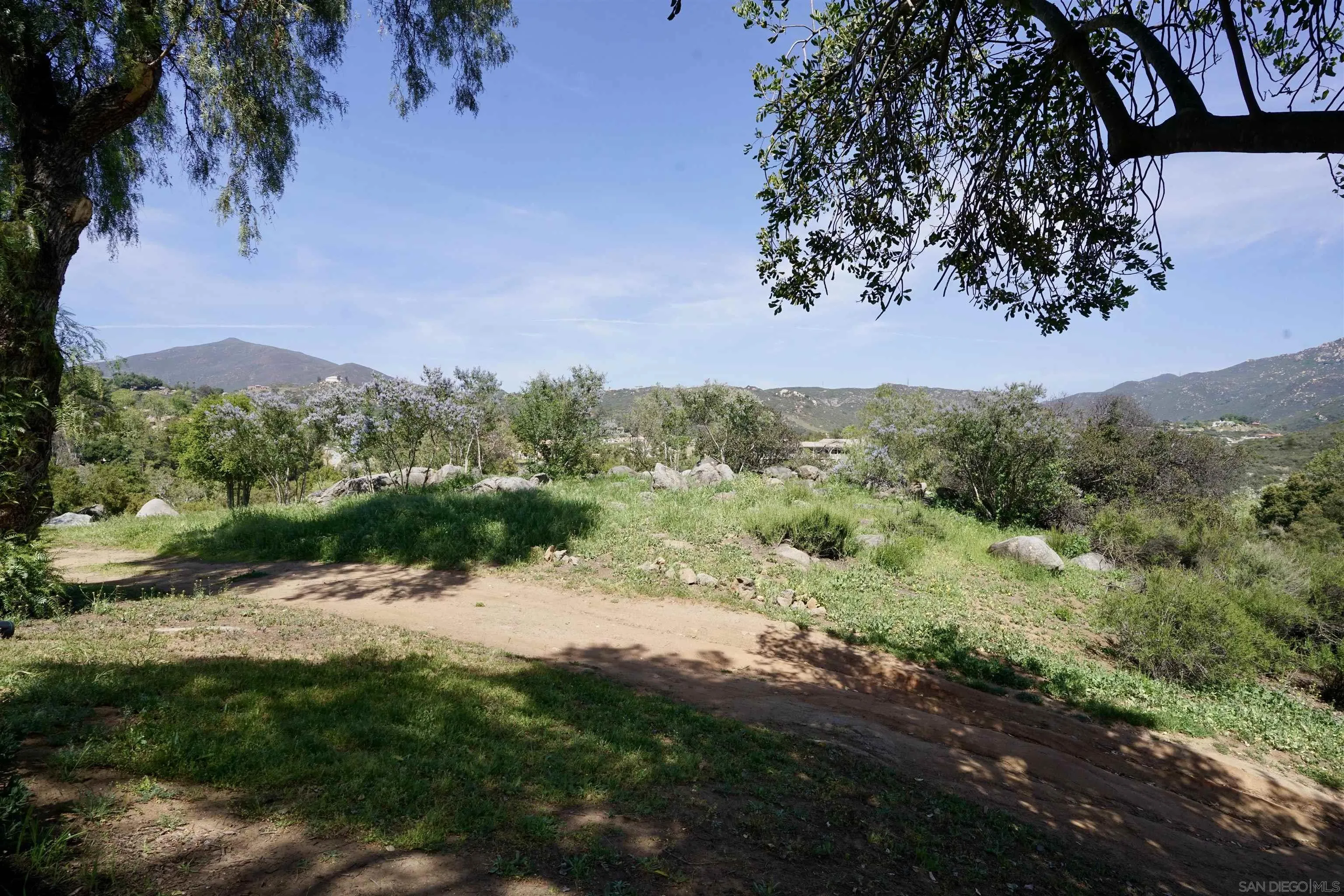 Via Viejas Oeste, Unit 43 Alpine, CA 91901 - Photo 20 of 28 a view of a lake with houses in the back