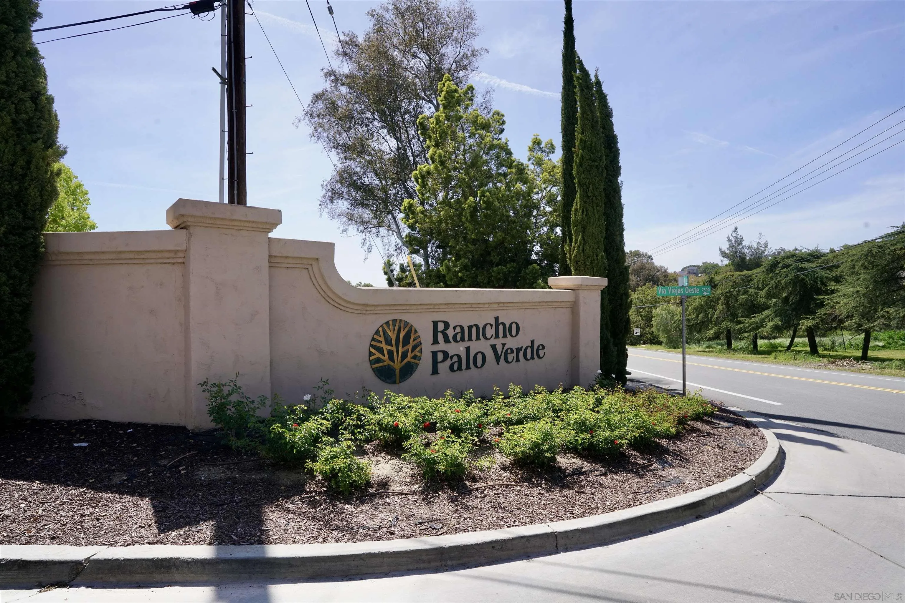 Via Viejas Oeste, Unit 43 Alpine, CA 91901 - Photo 21 of 28 a sign on the side of the road