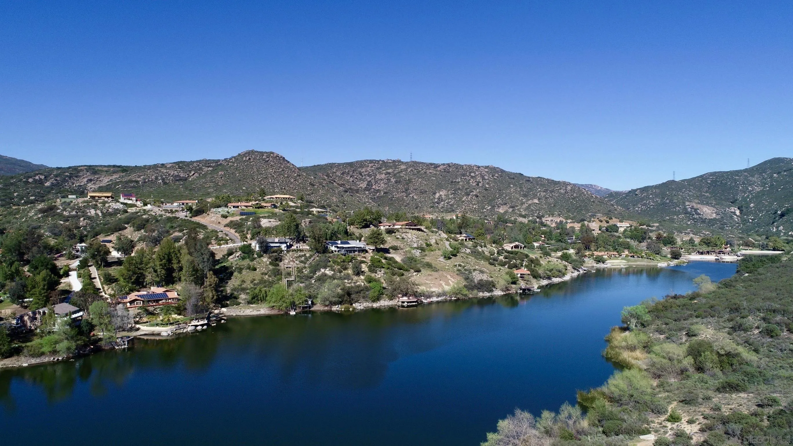Via Viejas Oeste, Unit 43 Alpine, CA 91901 - Photo 25 of 28 a view of a lake with a mountain in the background
