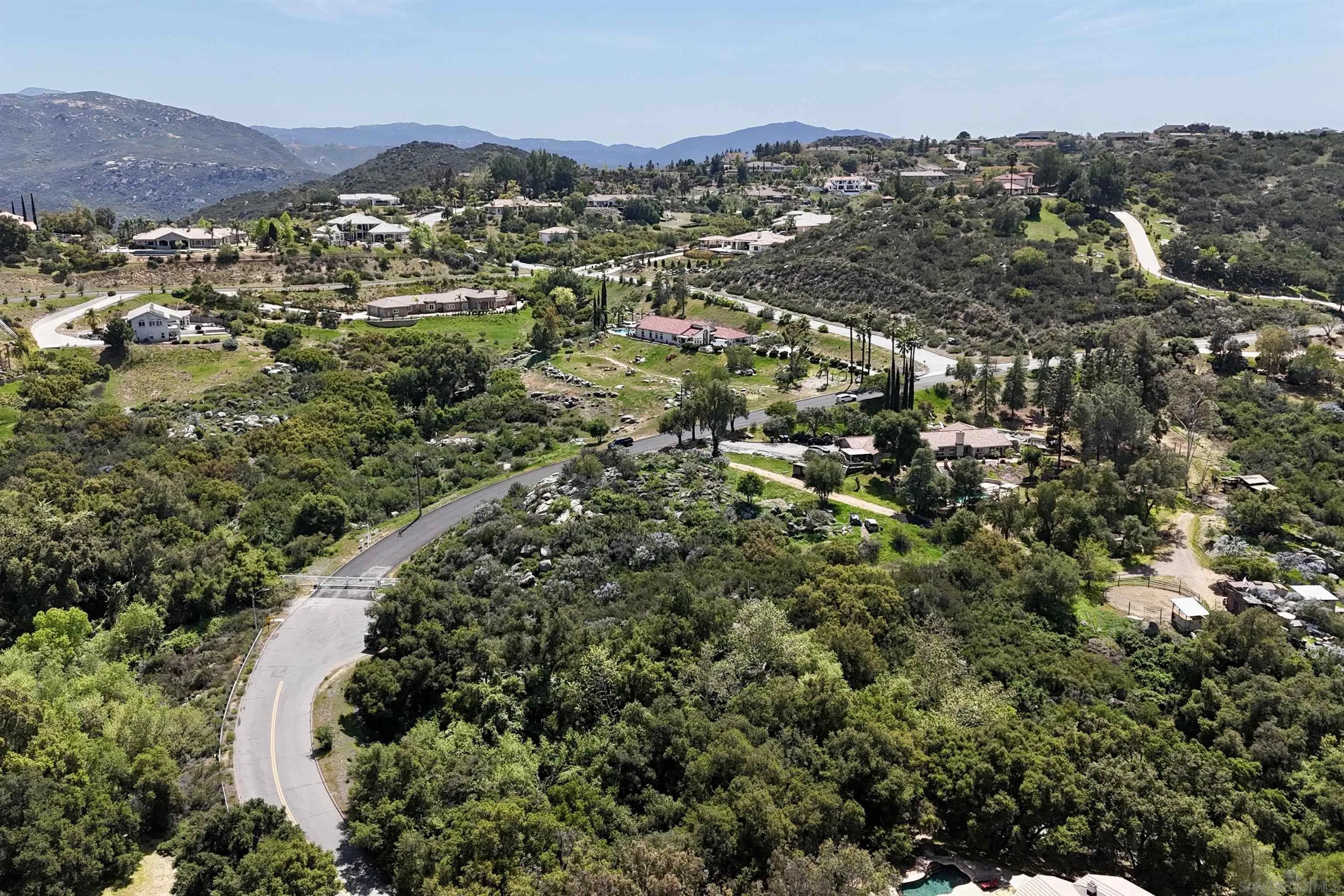 Via Viejas Oeste, Unit 43 Alpine, CA 91901 - Photo 9 of 28 an aerial view of residential houses with outdoor space and trees