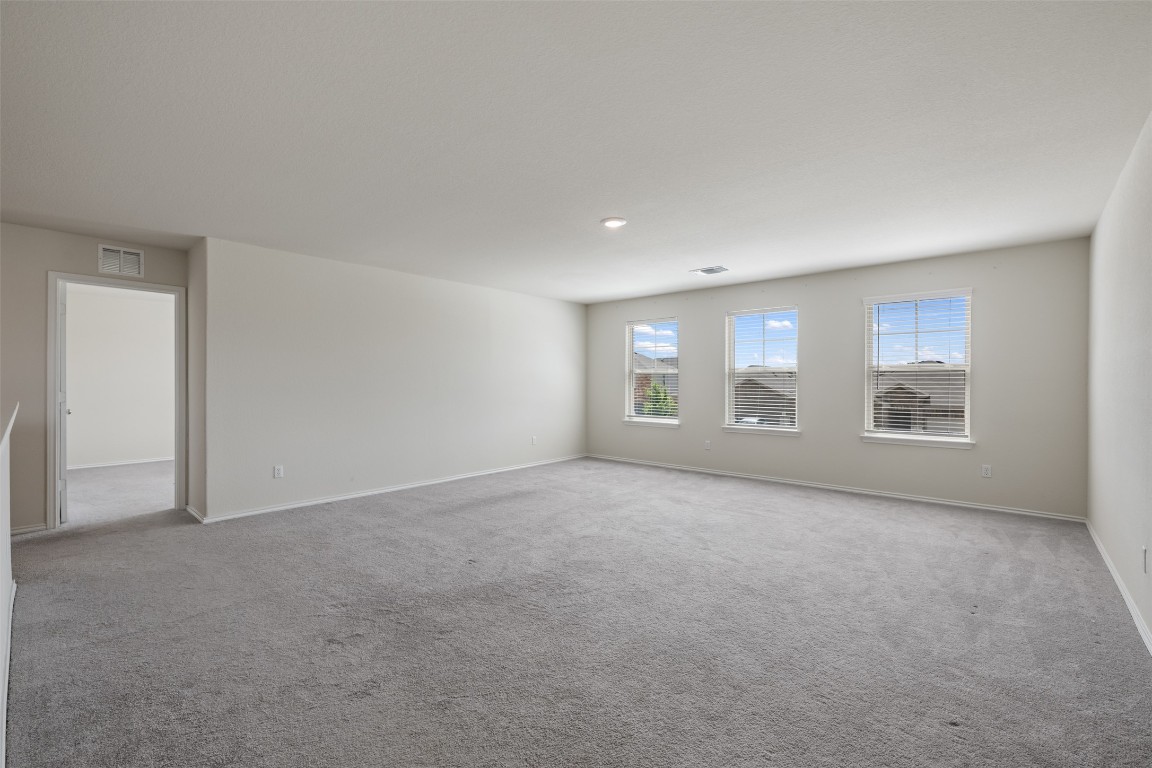 225 Gunther Way Taylor, TX 76574 - Photo 28 of 40 an empty room with windows