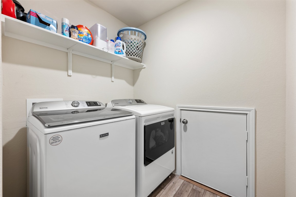225 Gunther Way Taylor, TX 76574 - Photo 36 of 40 a utility room with dryer and washer