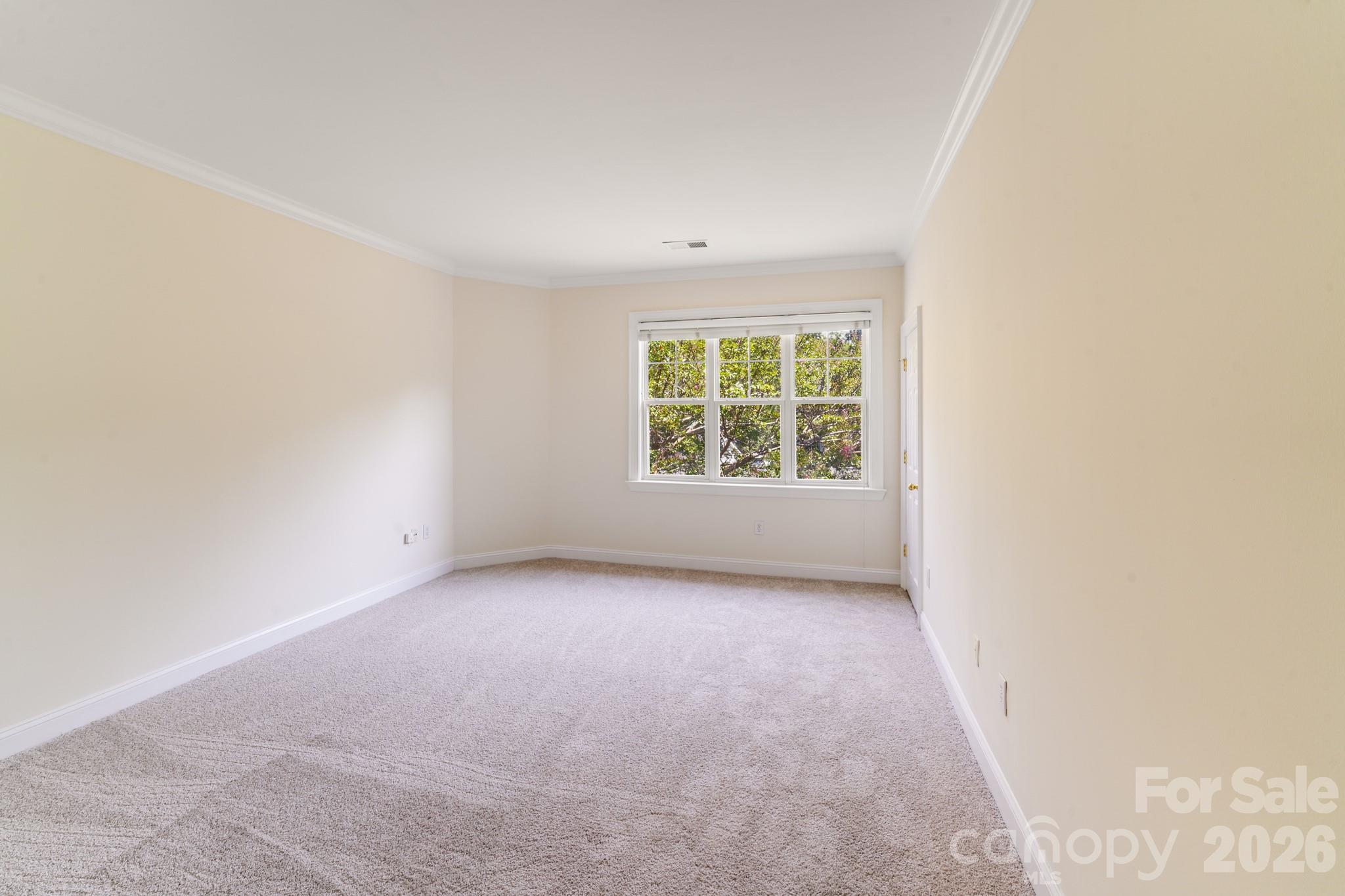 5601 Fairview Road, Unit 10 Charlotte, NC 28209 - Photo 14 of 28 an empty room with windows