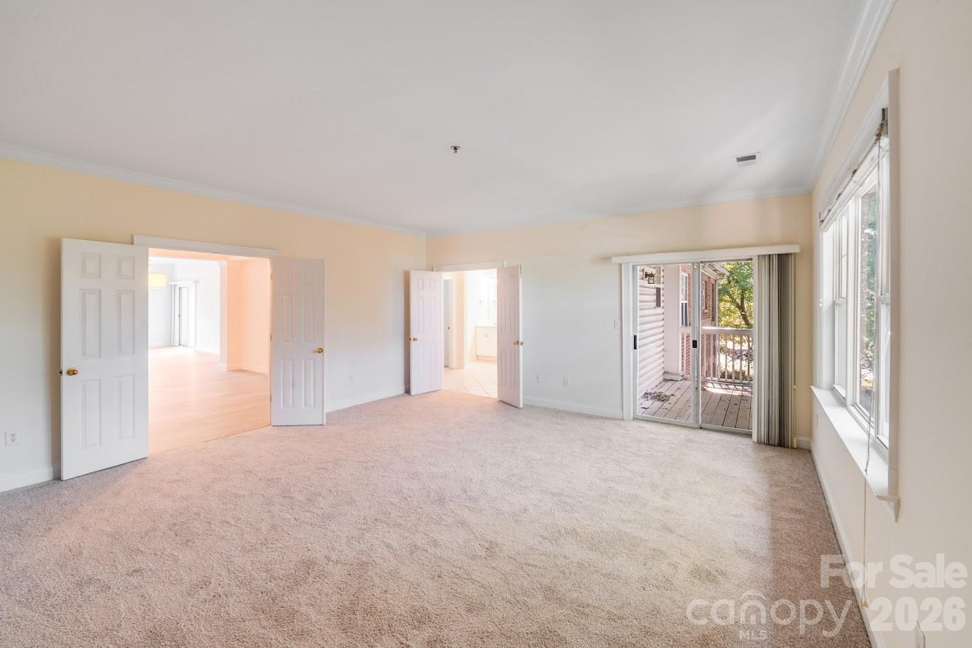 5601 Fairview Road, Unit 10 Charlotte, NC 28209 - Photo 17 of 28 a view of an empty room with a window
