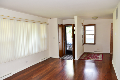 33268 North Mill Road Grayslake, IL 60030 - Photo 16 of 20 an empty room with wooden floor and windows