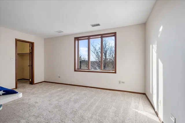 a bathroom with a sink double vanity and a mirror