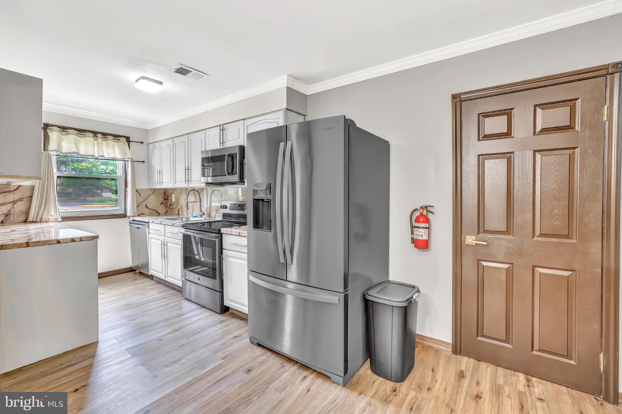 1475 Mt Holly Road, Unit O4 Beverly, NJ 08010 - Photo 11 of 18 Modern kitchen with sleek appliances.