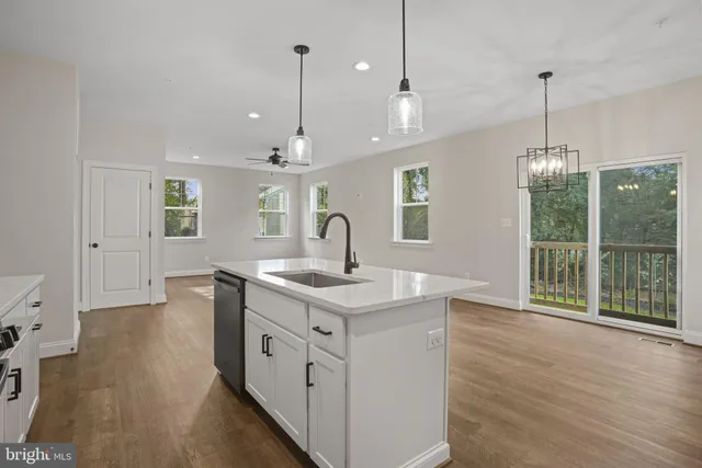 a kitchen with sink and window