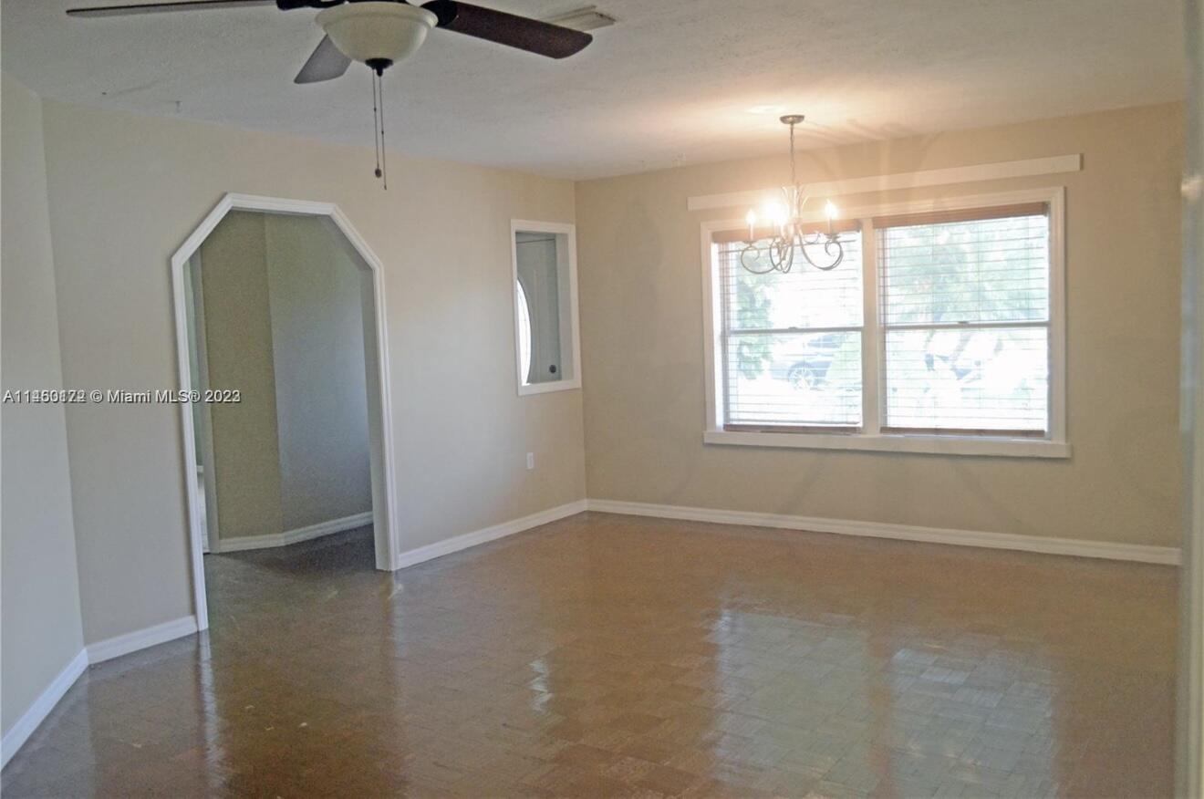 5000 Garner Street, Unit A Fort Pierce, FL 34981 - Photo 3 of 10 an empty room with windows and closet