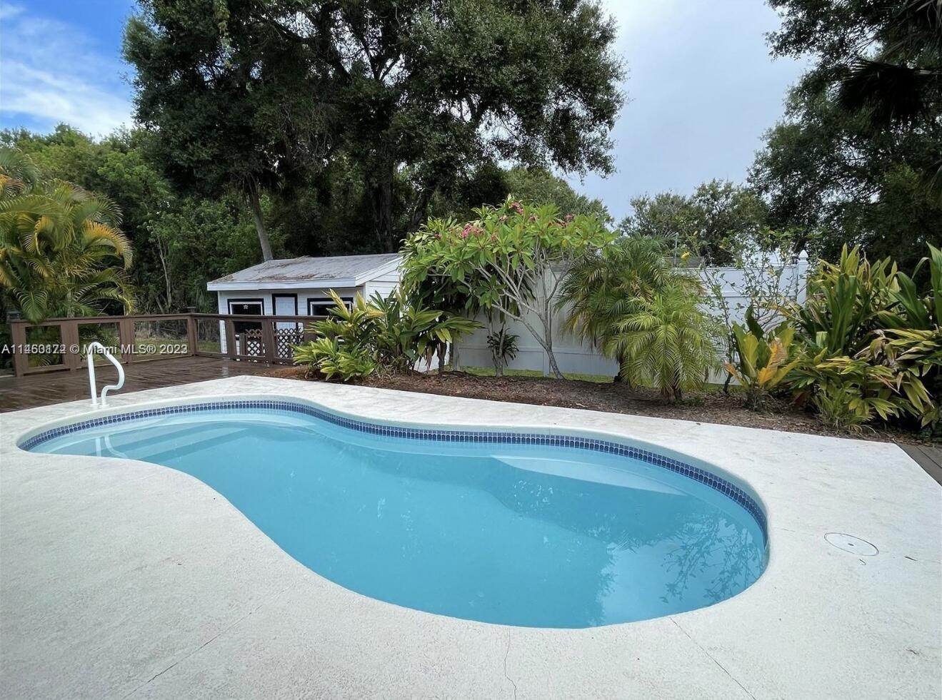 5000 Garner Street, Unit A Fort Pierce, FL 34981 - Photo 10 of 10 a view of outdoor space and swimming pool