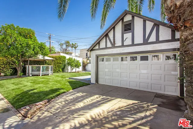 a view of a house with a garden