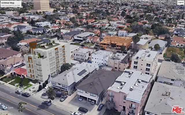 an aerial view of a city with lots of residential buildings