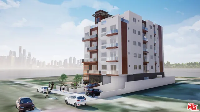 a city view with tall buildings and lake view