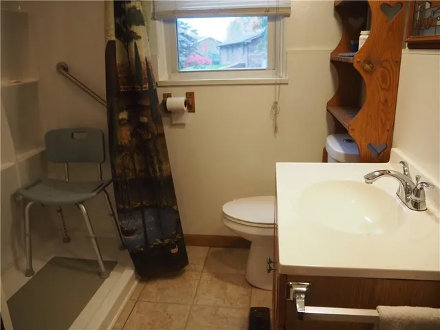 a bathroom with a sink and a toilet