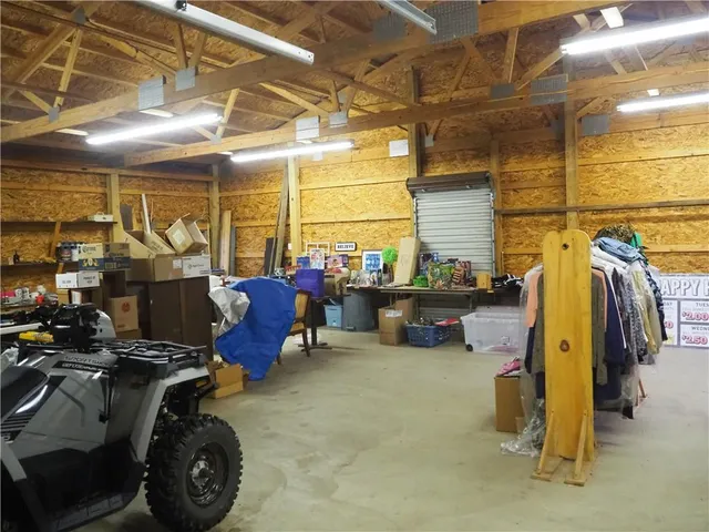 a house that has a tree in front of it