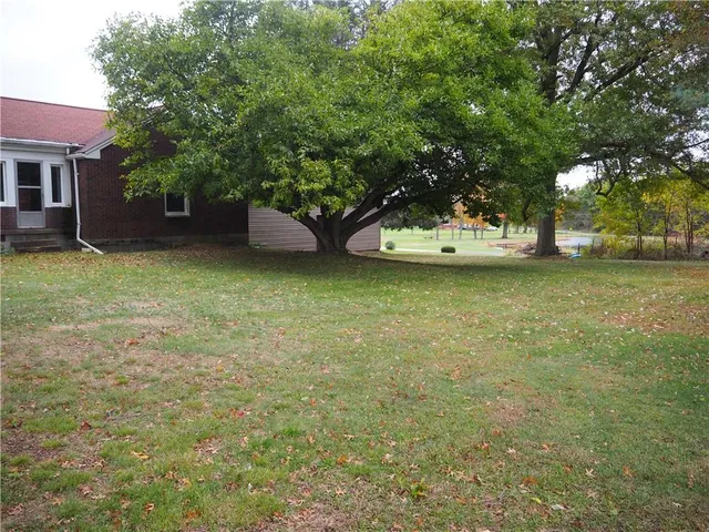 a room with gym equipment and a window