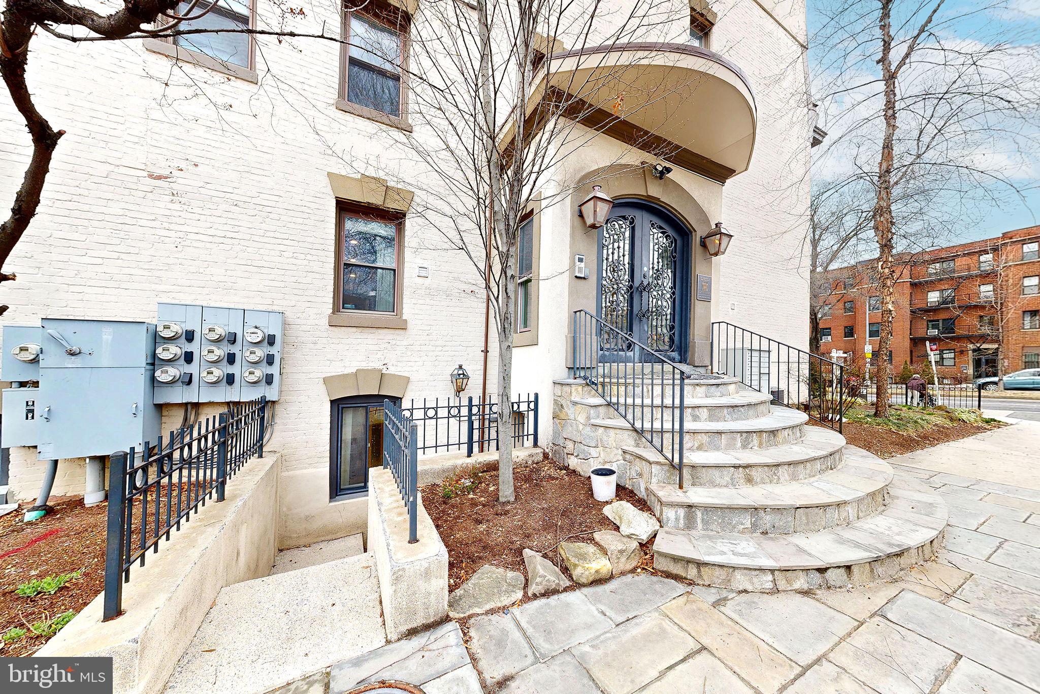 6 Rhode Island Avenue Northwest, Unit 2 Washington, DC 20001 - Photo 25 of 29 a building exterior with furniture and garden