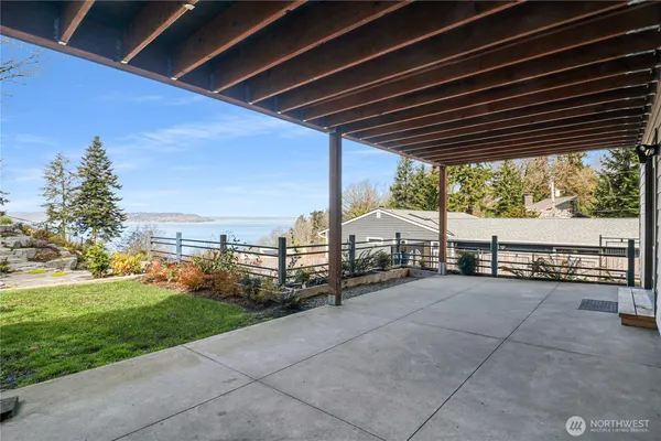 a view of a backyard of the house