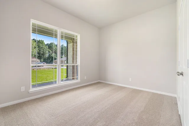 an empty room with windows