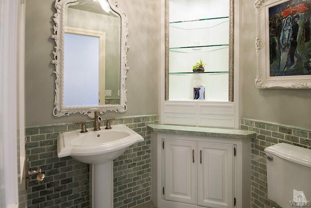 1784 Upper Ranch Road Westlake Village, CA 91362 - Photo 14 of 53 a bathroom with a sink and a mirror