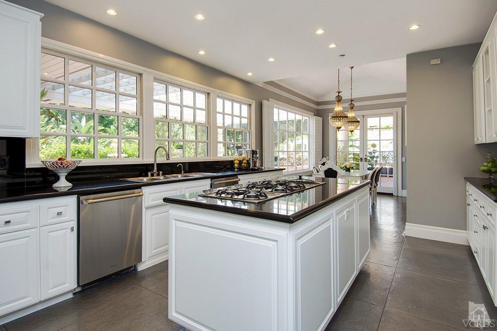 1784 Upper Ranch Road Westlake Village, CA 91362 - Photo 15 of 53 a large kitchen with kitchen island granite countertop a large window