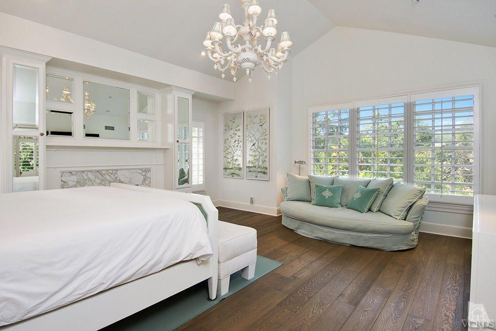 1784 Upper Ranch Road Westlake Village, CA 91362 - Photo 26 of 53 a bedroom with a large bed and a couch