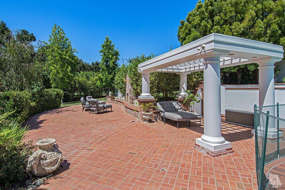 1784 Upper Ranch Road Westlake Village, CA 91362 - Photo 47 of 53 a backyard of a house with table and chairs