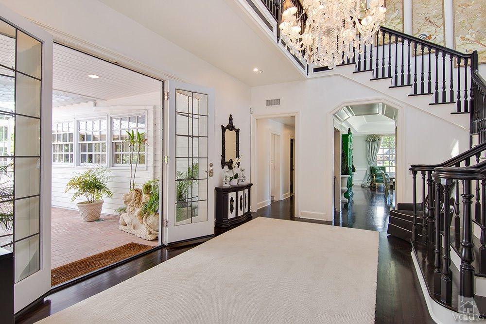 1784 Upper Ranch Road Westlake Village, CA 91362 - Photo 6 of 53 a view of a hallway to a livingroom with furniture