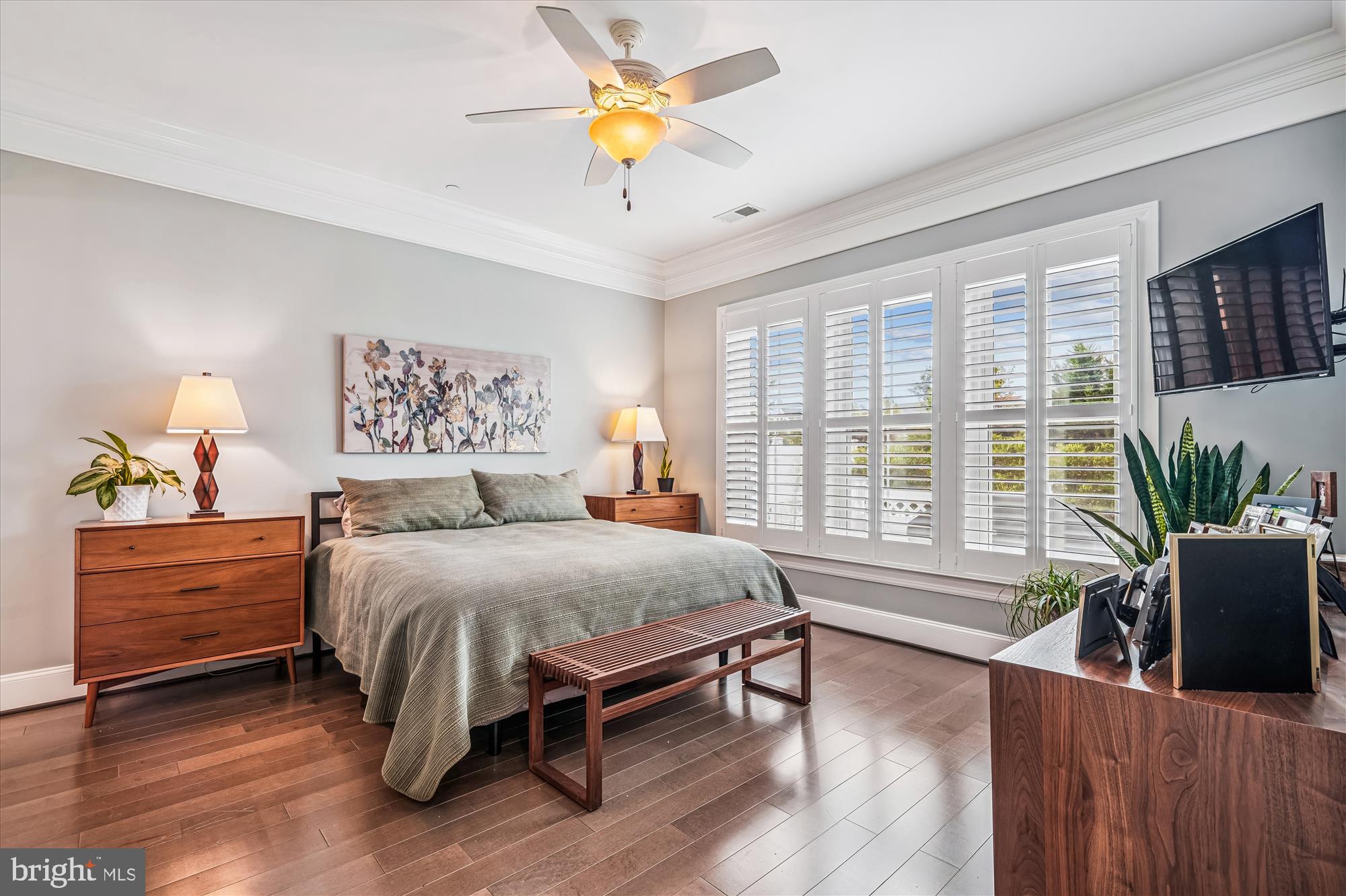 1222 Beaver Tree Drive Odenton, MD 21113 - Photo 11 of 24 a bedroom with a bed and a chandelier