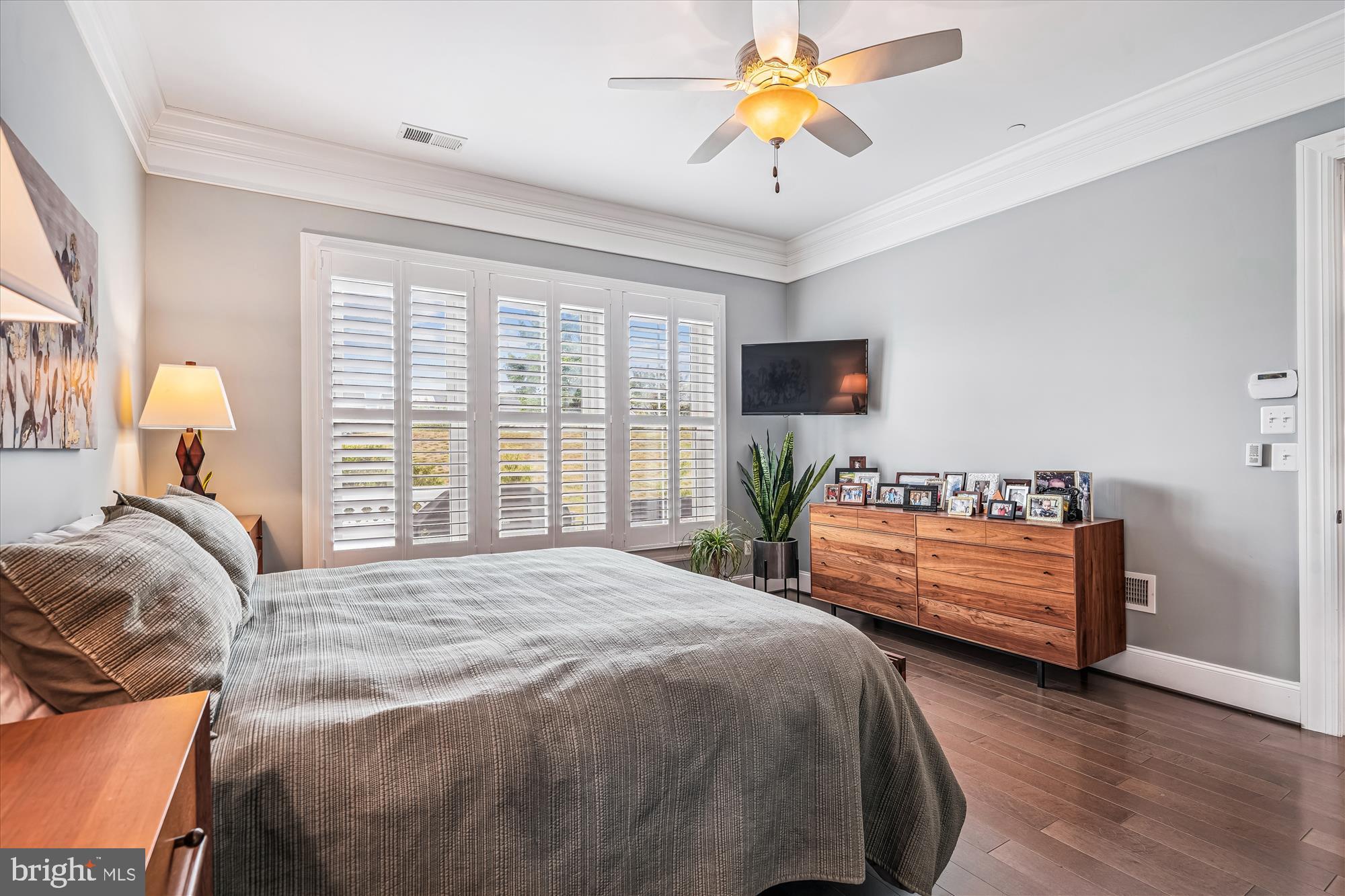 1222 Beaver Tree Drive Odenton, MD 21113 - Photo 13 of 24 a bedroom with a bed and a chandelier