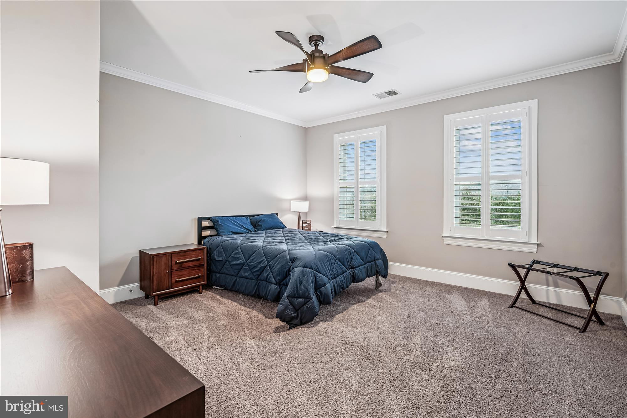 1222 Beaver Tree Drive Odenton, MD 21113 - Photo 17 of 24 a spacious bedroom with a bed and a couch