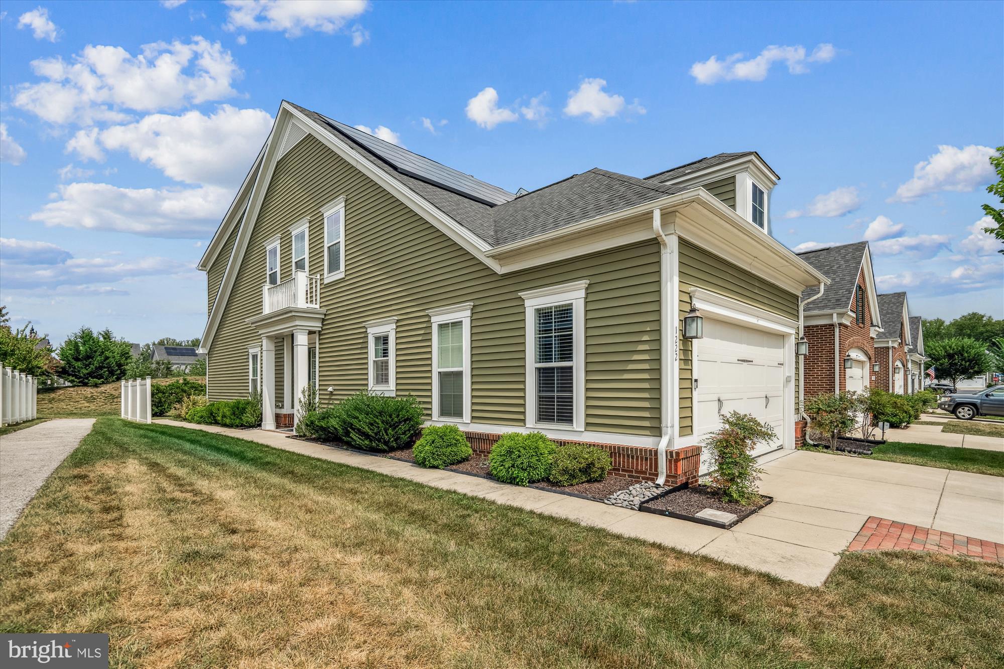 1222 Beaver Tree Drive Odenton, MD 21113 - Photo 2 of 24 a front view of a house with garden