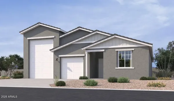 a front view of a house with yard