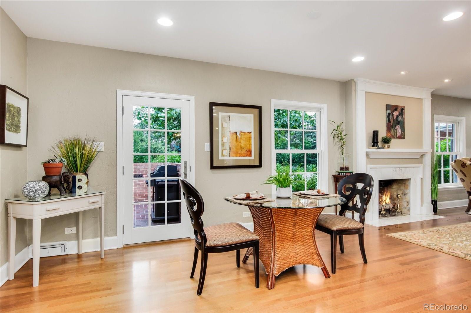 5225 Ridge Trail Bow Mar, CO 80123 - Photo 22 of 40 a dining room with furniture and window