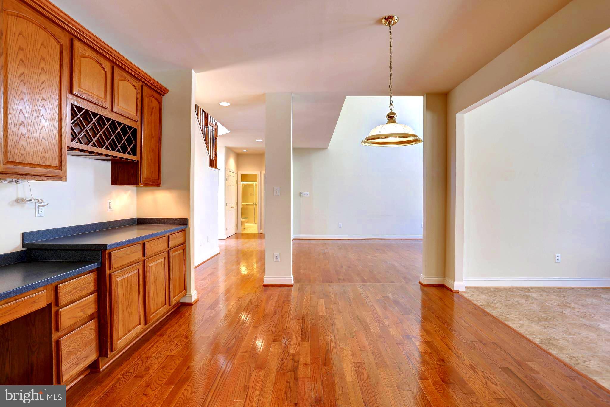 1618 Braid Hills Drive Pasadena, MD 21122 - Photo 35 of 92 view from kitchen into hall and family room