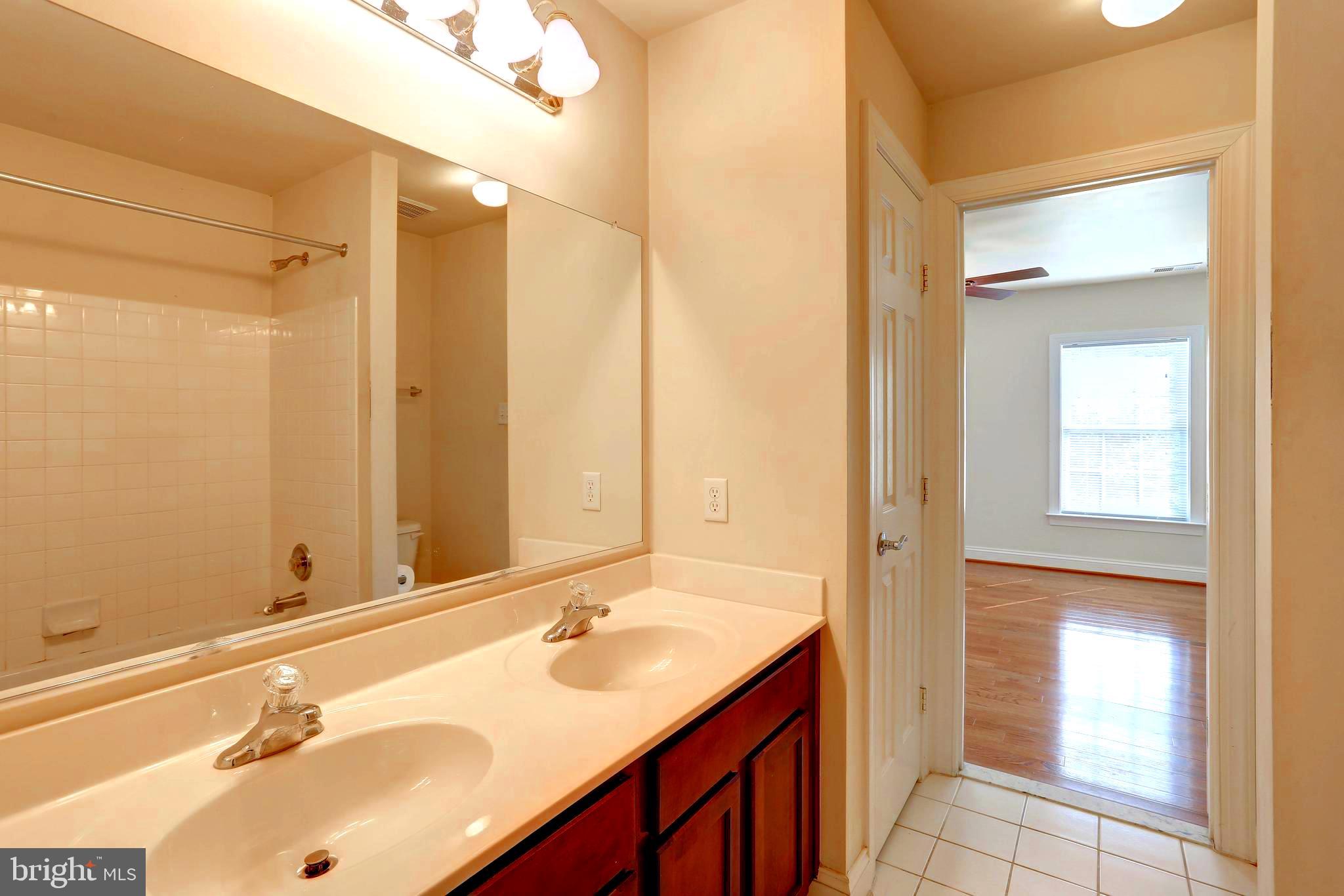 1618 Braid Hills Drive Pasadena, MD 21122 - Photo 44 of 92 shared bathroom connects bedroom 2 and 4