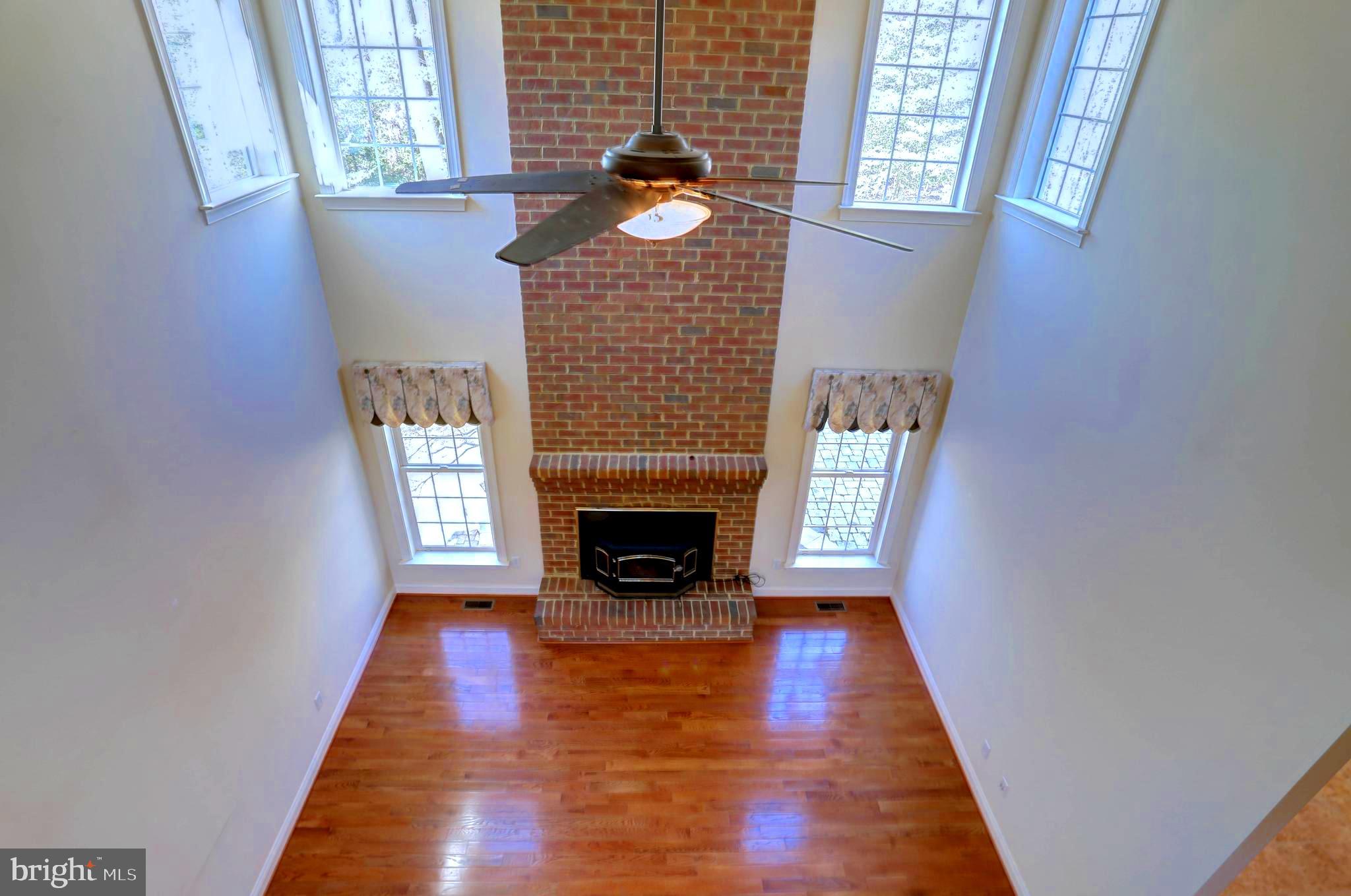 1618 Braid Hills Drive Pasadena, MD 21122 - Photo 46 of 92 view into family room from upper level hallway