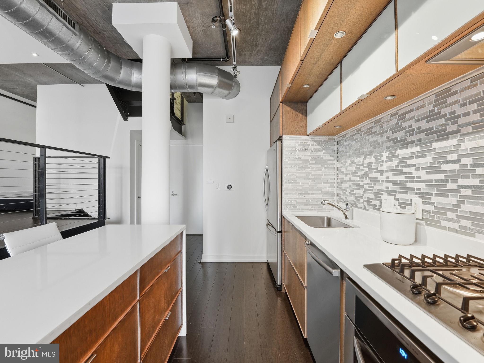 1515 15th Street Northwest, Unit 401 Washington, DC 20005 - Photo 9 of 37 Gourmet Kitchen with Custom Cabinetry