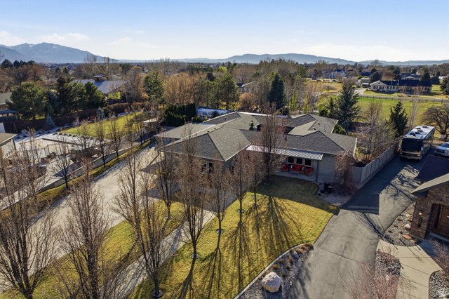 145 Carnesecca Court Mapleton, UT 84664 - Photo 3 of 109 Aerial view of residential area with a mountainous background