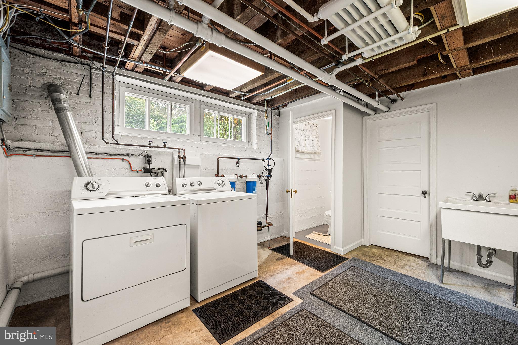 400 South Chester Road Swarthmore, PA 19081 - Photo 53 of 66 Basement laundry room with water closet.